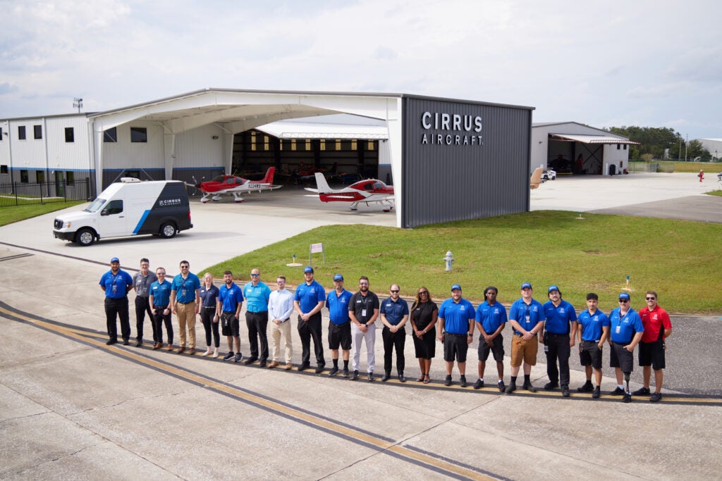 The Cirrus Orlando team in front of the hangar 