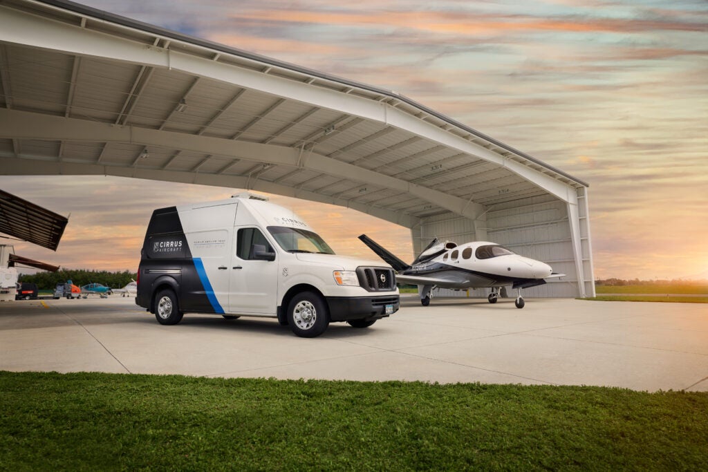 van and vision jet in hangar